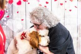 Aji, Elder Orphan Care's therapy dog, brings lots of love and hugs to everyone he meets!